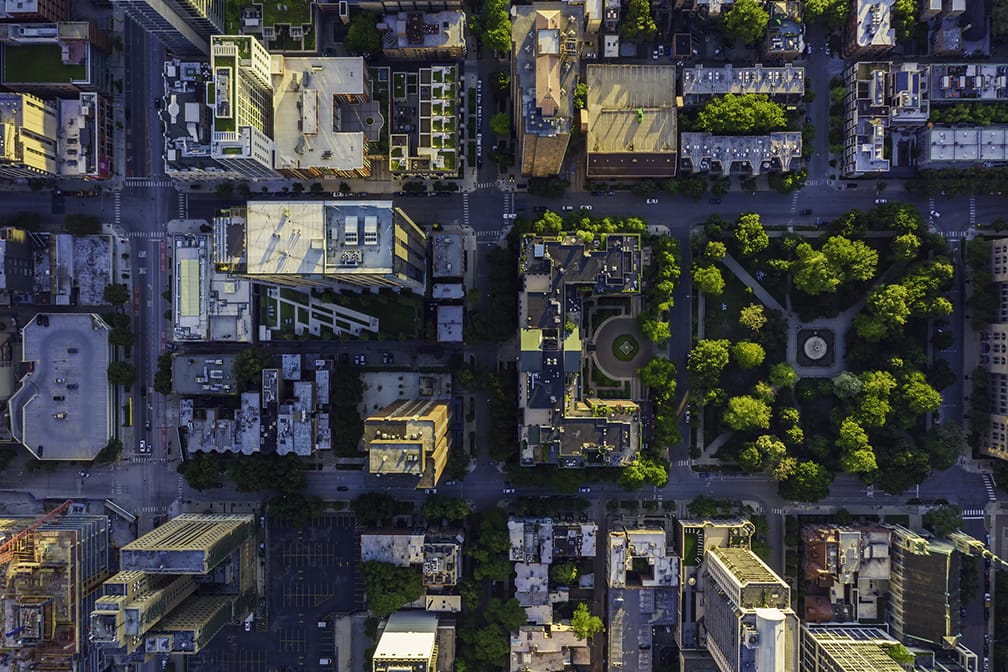 Top down aerial view of Chicago Downtown urban grid with park. Late afternoon light